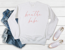 Load image into Gallery viewer, Softest Crewneck Sweatshirt. Designed to elevate your vibe to help you live your intention. Breathe babe print. Some days are amazing, everything is just working out and you are rockin&#39; it- breathe it in babe, soak it all up. And when it&#39;s not one of those days, because sometimes no matter what we do, it just isn&#39;t. Stop, and breathe babe, and trust you will get through it. White sweatshirt with pink breathe babe print.
