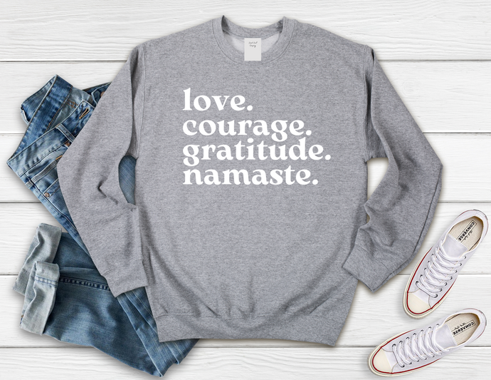 Softest Crewneck Sweatshirt. Designed to elevate your vibe to help you live your intention.  The mantra shirt. Love, courage, gratitude, namaste. Grey crewneck sweatshirt with white print- love, courage, gratitude, namaste.