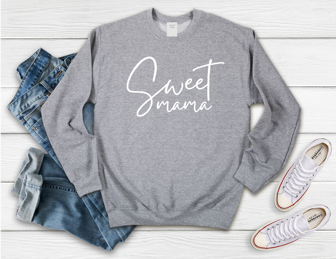Softest Crewneck Sweatshirt. Designed to elevate your vibe to help you live your intention. You are amazing mama. The days can be the best, the worst, so fulfilling, the most stressful, crying, laughing, napping, and caffeine- all before noon. I am a mom too. I get it. I promise you babe, you've got this- even when it feels like you don't. To them, you are a sweet mama, no matter what moment YOU are in. Grey crewneck sweatshirt with white sweet mama print.