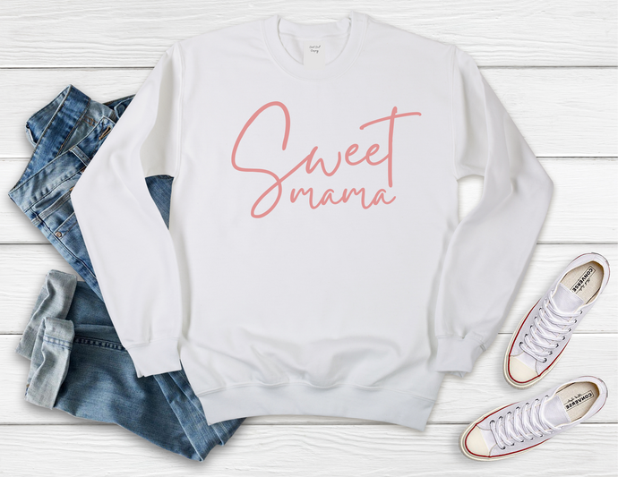 Softest Crewneck Sweatshirt. Designed to elevate your vibe to help you live your intention. You are amazing mama. The days can be the best, the worst, so fulfilling, the most stressful, crying, laughing, napping, and caffeine- all before noon.  I am a mom too. I get it.  I promise you babe, you've got this- even when it feels like you don't. To them, you are a sweet mama, no matter what moment YOU are in. White crewneck sweatshirt with pink sweet mama print. 